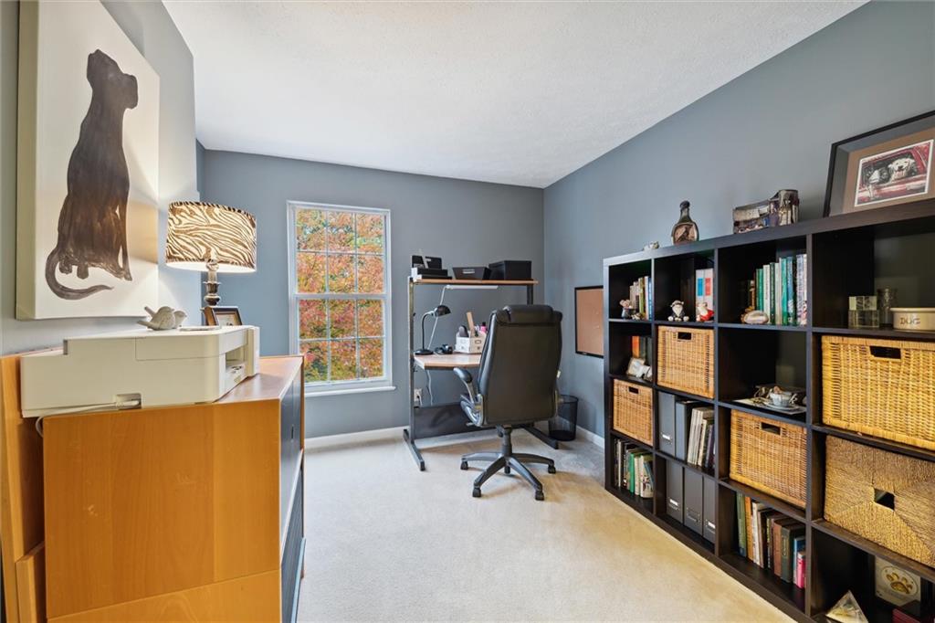 313 Timberlake Drive Venetia, PA 15367 - Photo 31 of 49 a view of a workspace with furniture and a bookshelf