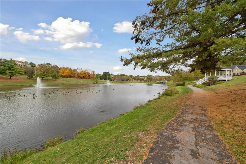 313 Timberlake Drive Venetia, PA 15367 - Photo 41 of 49 a view of a lake with houses in the back