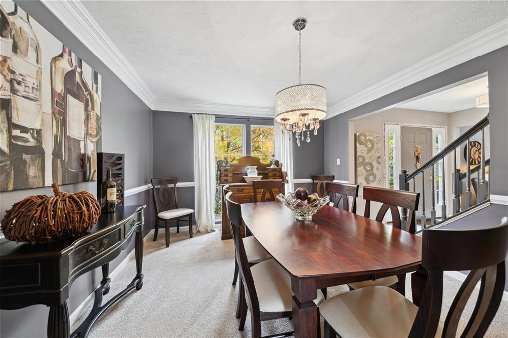 313 Timberlake Drive Venetia, PA 15367 - Photo 10 of 49 a view of a dining room with furniture window and wooden floor