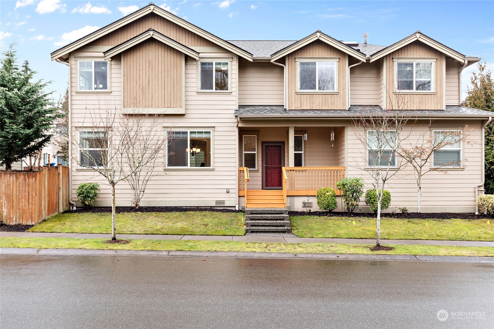 1700 235th Place Southwest Bothell, WA 98021 - Photo 1 of 36 a view of a house with a small yard and large parking space