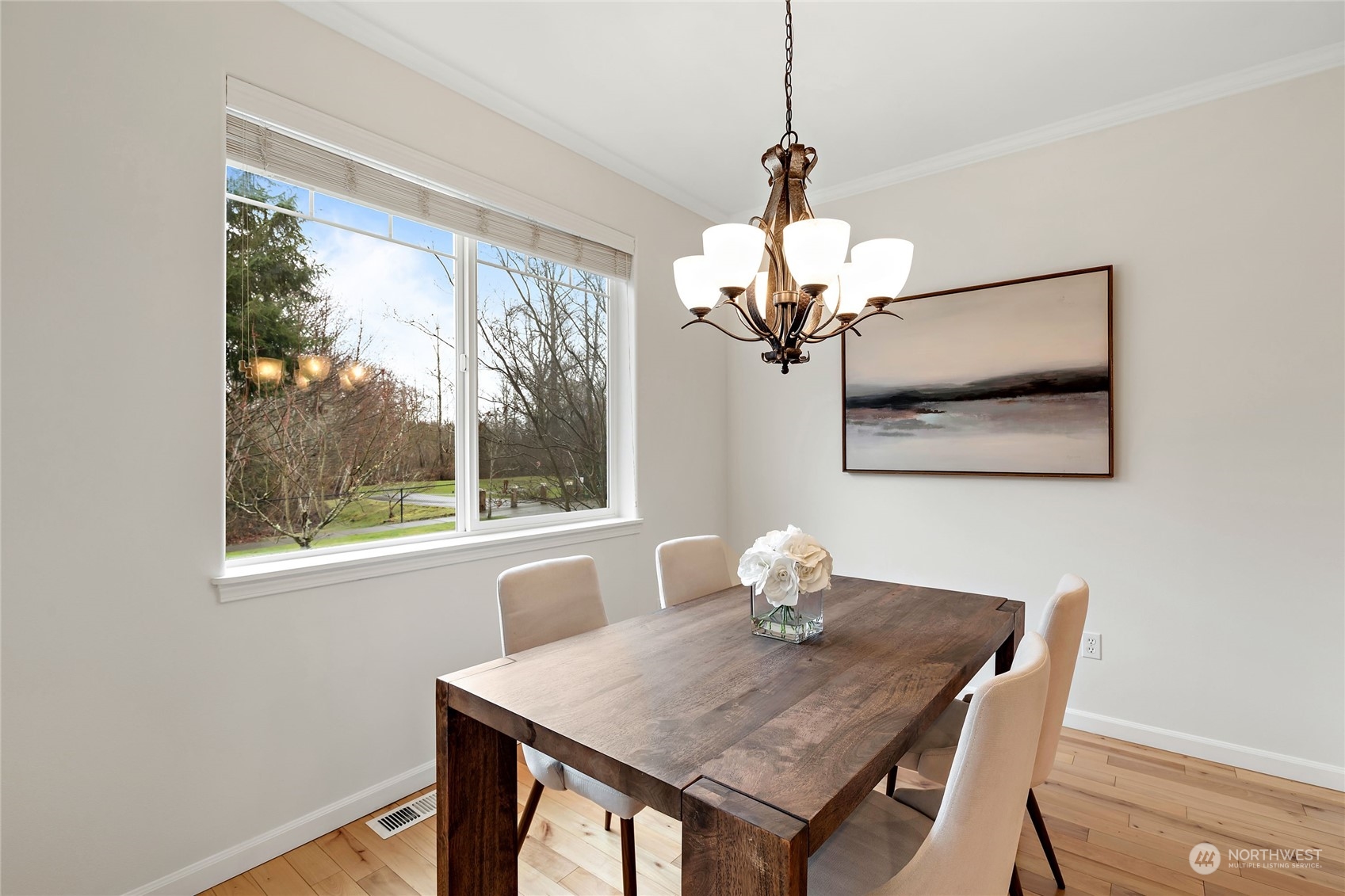 1700 235th Place Southwest Bothell, WA 98021 - Photo 14 of 36 a dining room with a table and chairs