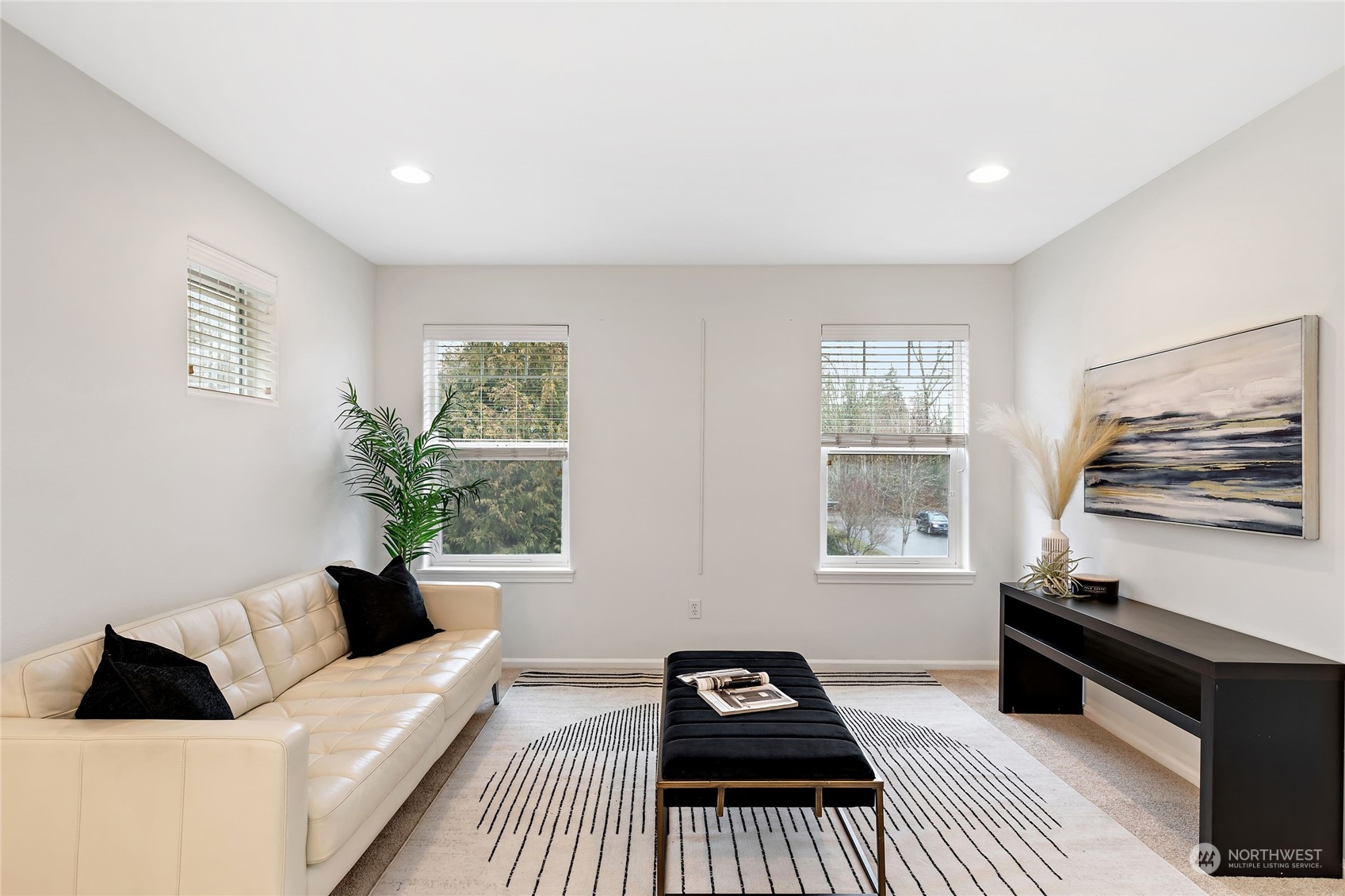 1700 235th Place Southwest Bothell, WA 98021 - Photo 17 of 36 a living room with furniture and a window