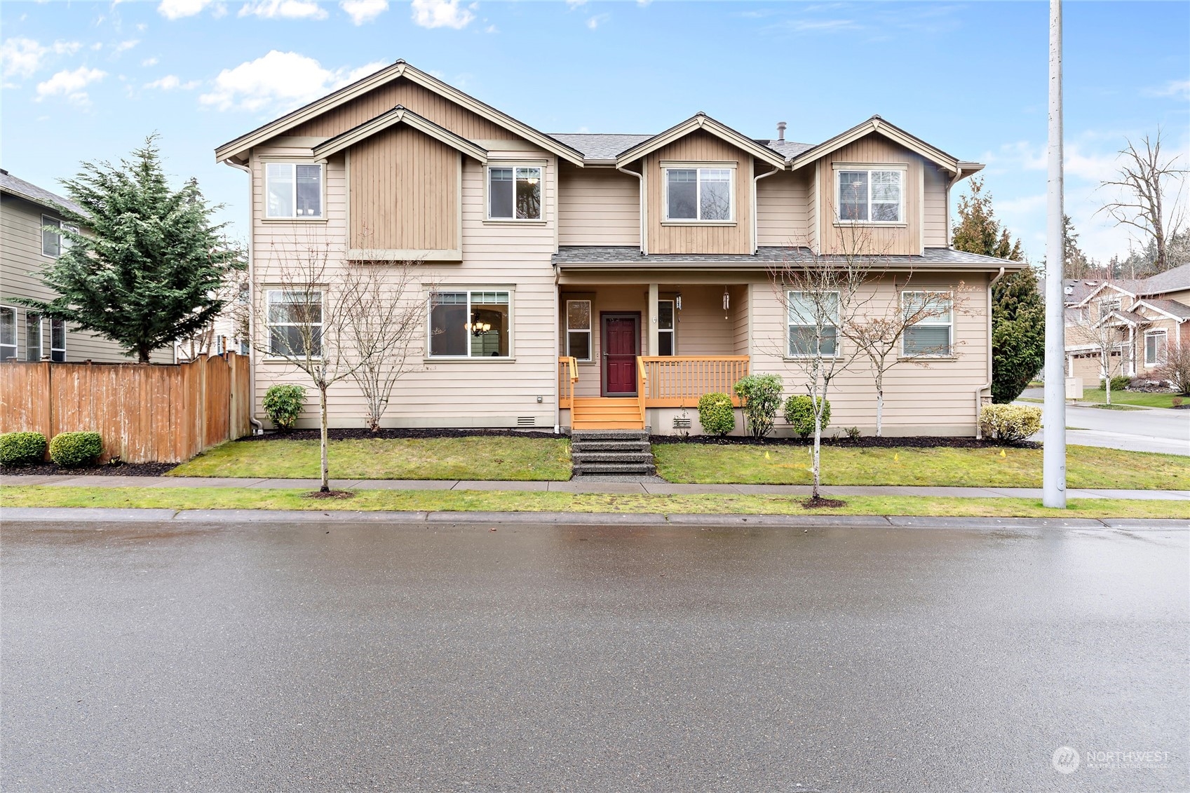 1700 235th Place Southwest Bothell, WA 98021 - Photo 2 of 36 a view of a house with a swimming pool and a yard