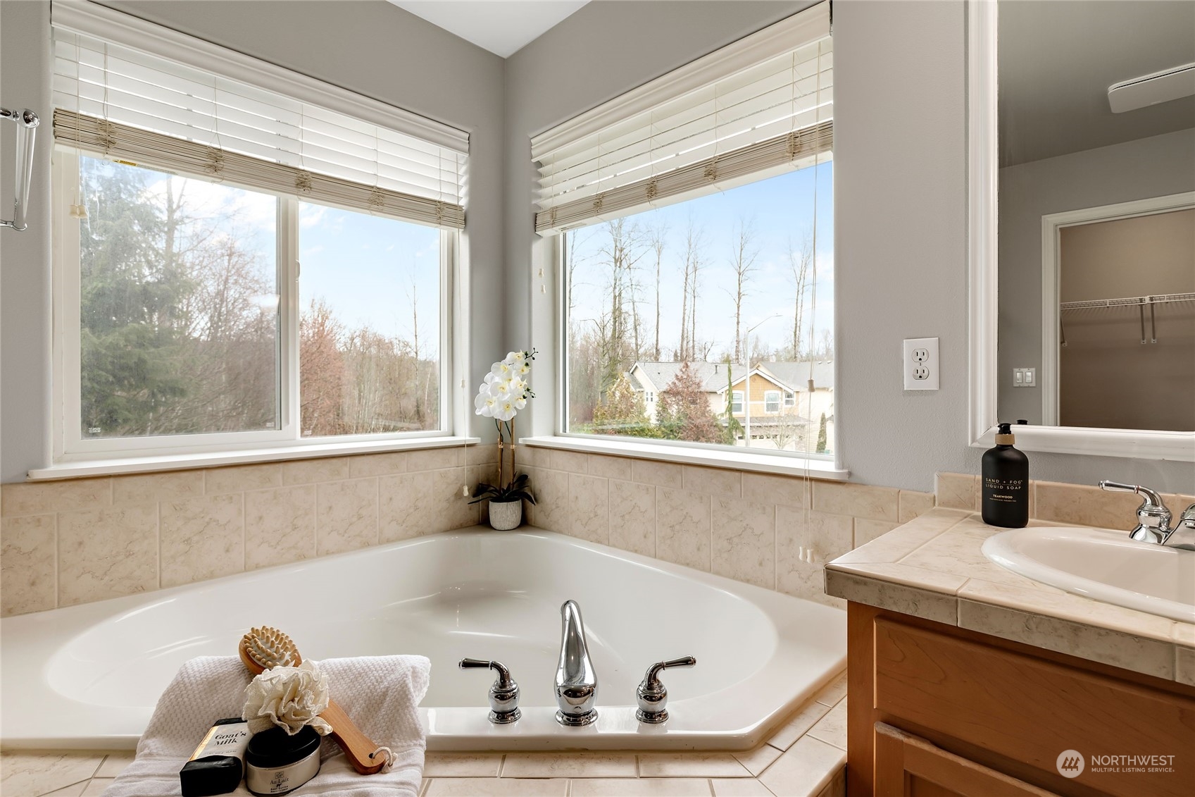 1700 235th Place Southwest Bothell, WA 98021 - Photo 33 of 36 a bath tub sitting in a bathroom next to a window