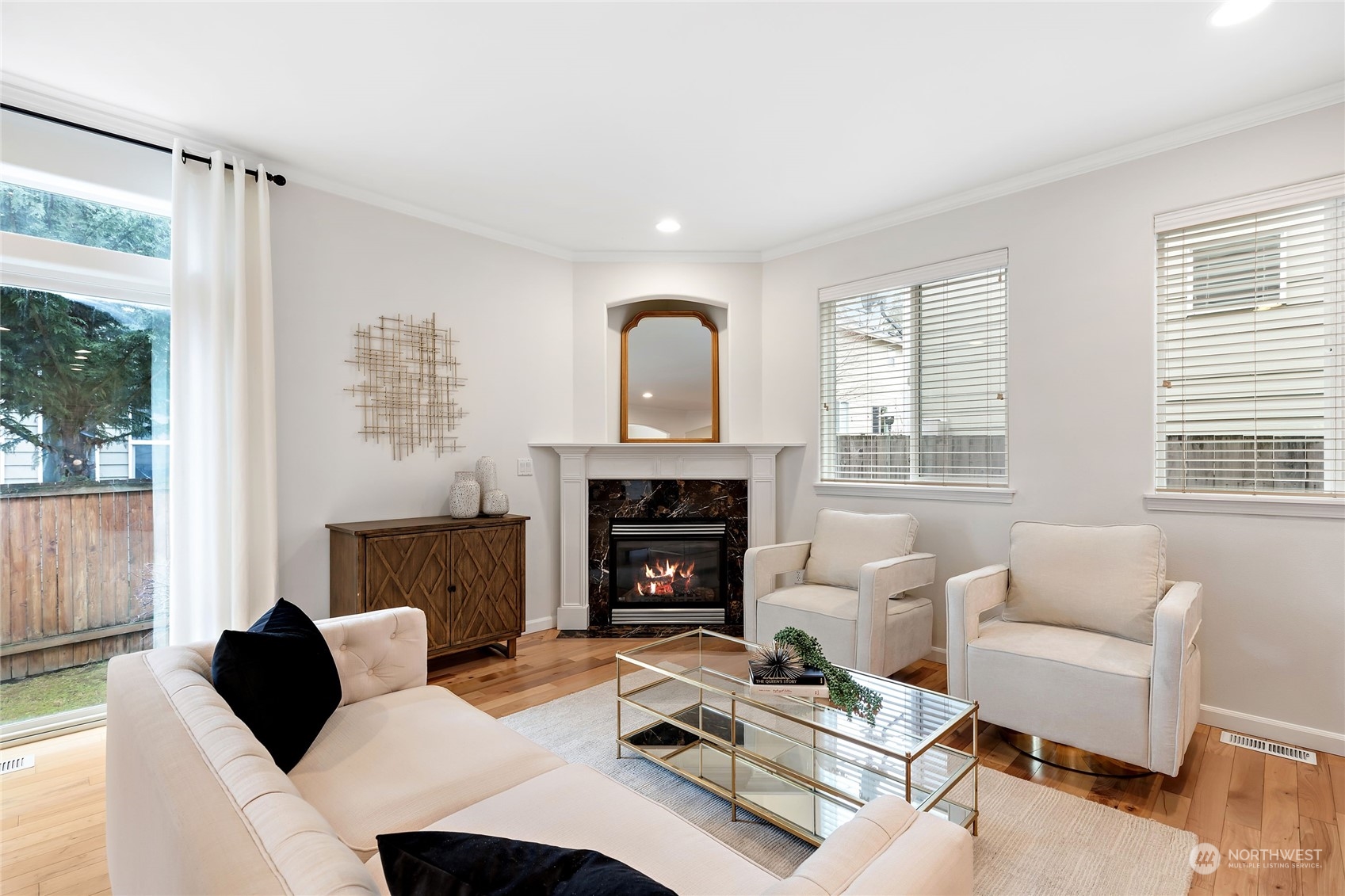 1700 235th Place Southwest Bothell, WA 98021 - Photo 6 of 36 a living room with furniture and a fireplace