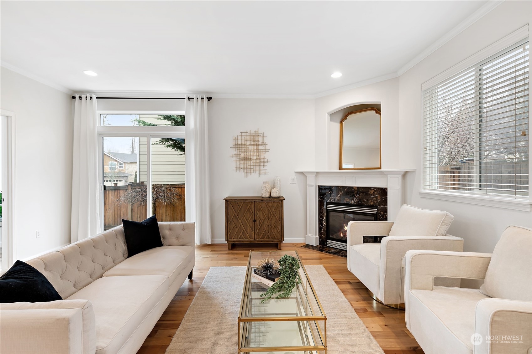 1700 235th Place Southwest Bothell, WA 98021 - Photo 7 of 36 a living room with furniture and a fireplace