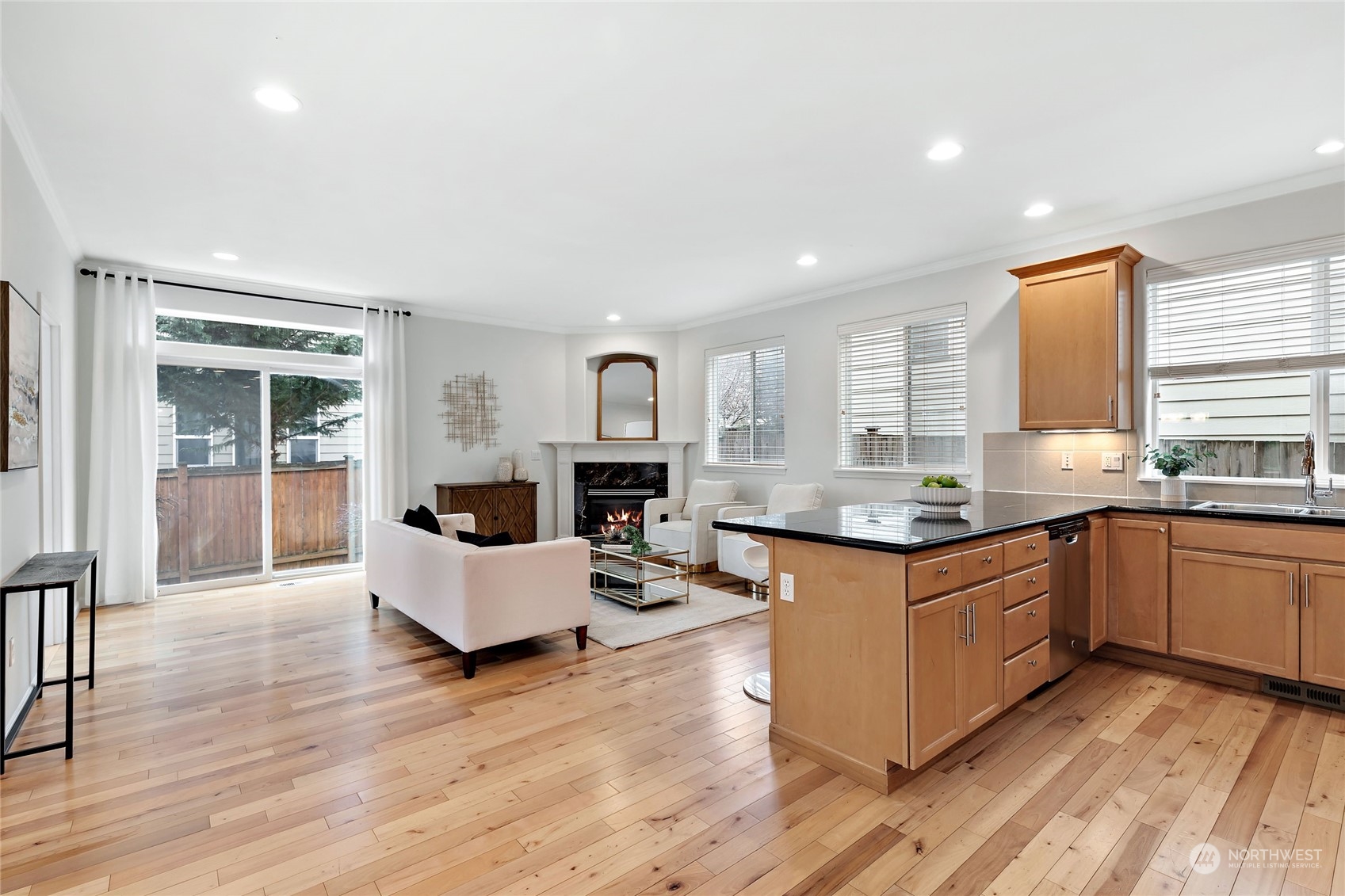 1700 235th Place Southwest Bothell, WA 98021 - Photo 9 of 36 a kitchen with granite countertop a stove and cabinets