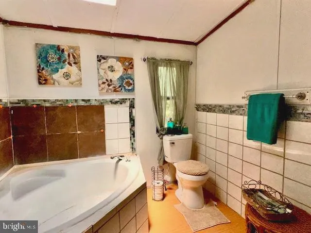 a bathroom with a sink and toilet