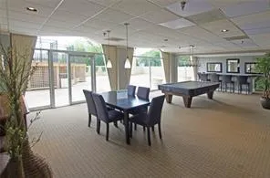 a view of a swimming pool with a yard