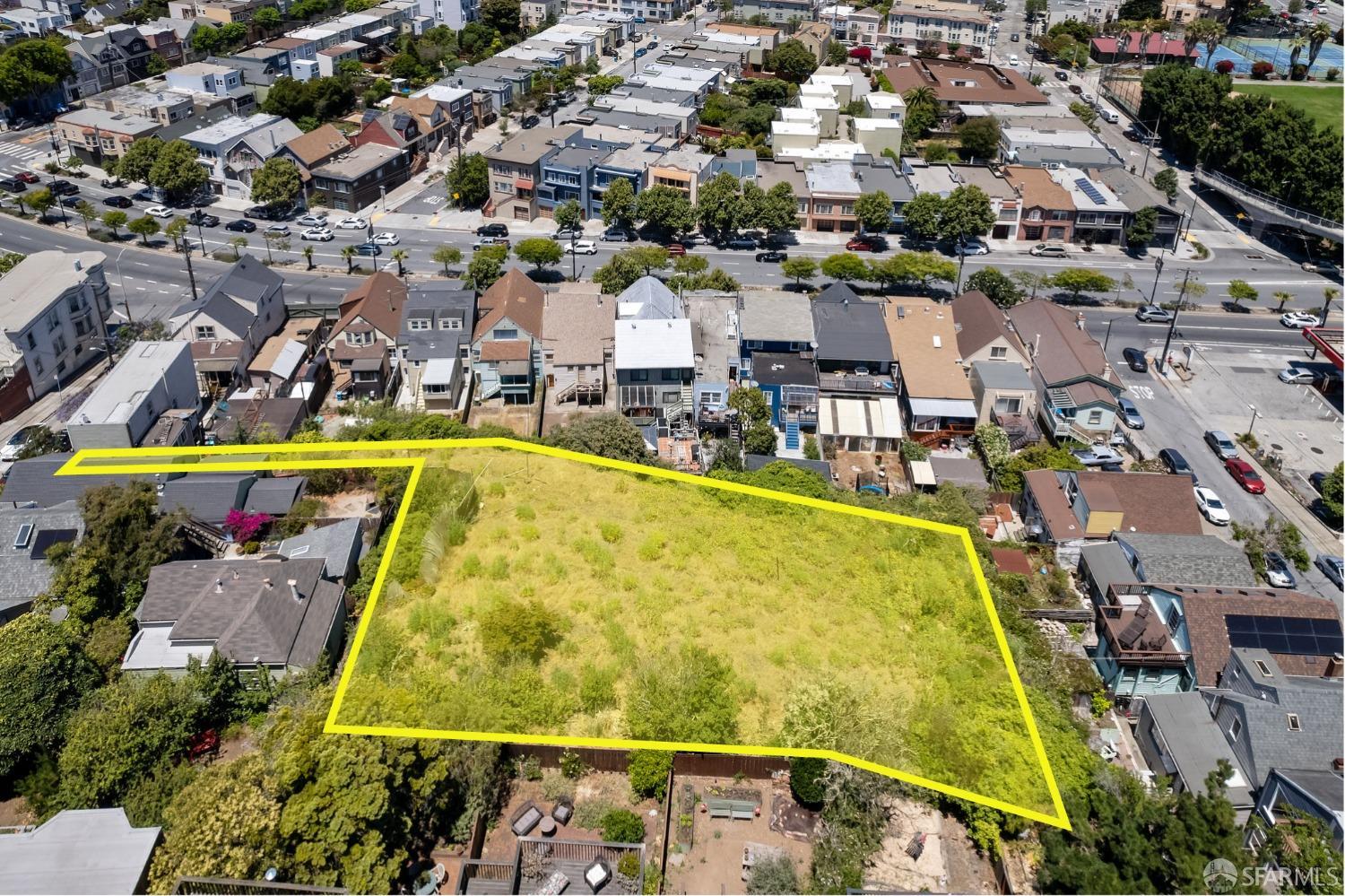 1513 York Street San Francisco, CA 94110 - Photo 12 of 12 an aerial view of a swimming pool with outdoor seating and yard