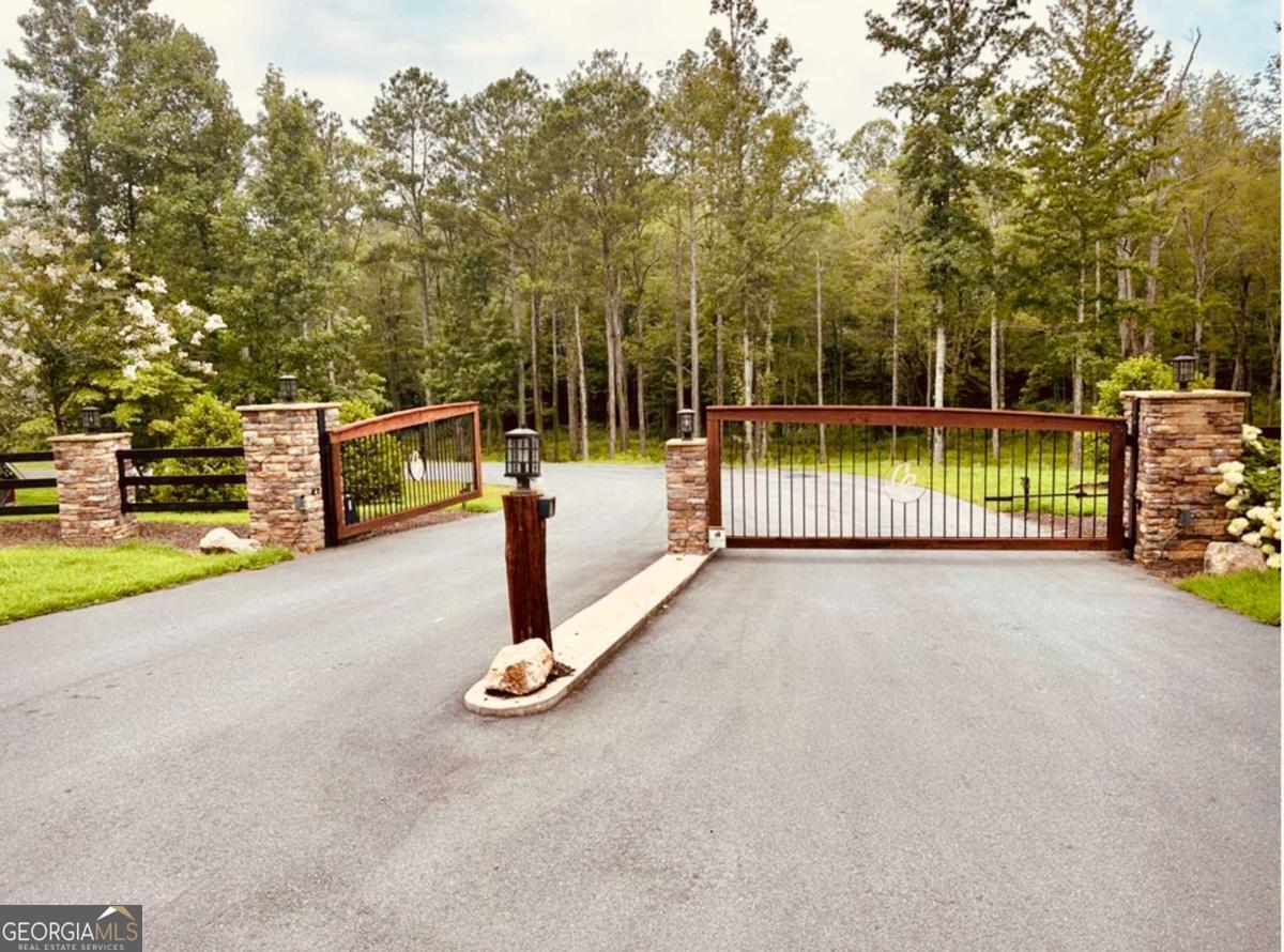 Lot 314 Pebble Trace, Unit 314 Talking Rock, GA 30175 - Photo 8 of 10 a view of a park with swings on the wall