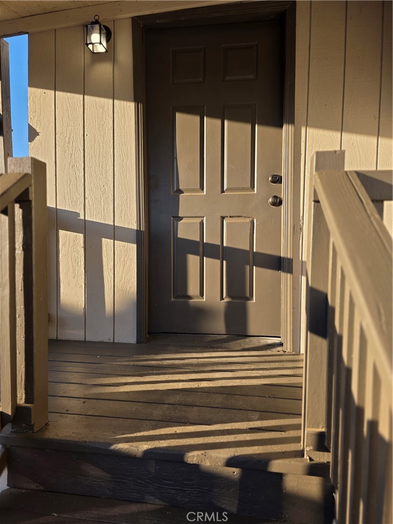 5200 Crest Road, Unit 91 Atwater, CA 95301 - Photo 1 of 9 a view of entry way with wooden floor