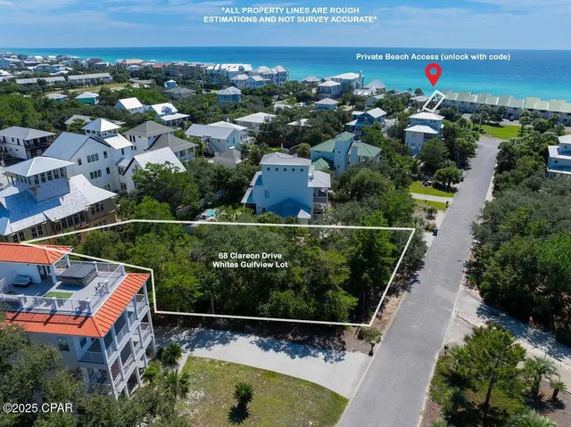 an aerial view of residential houses with outdoor space and street view