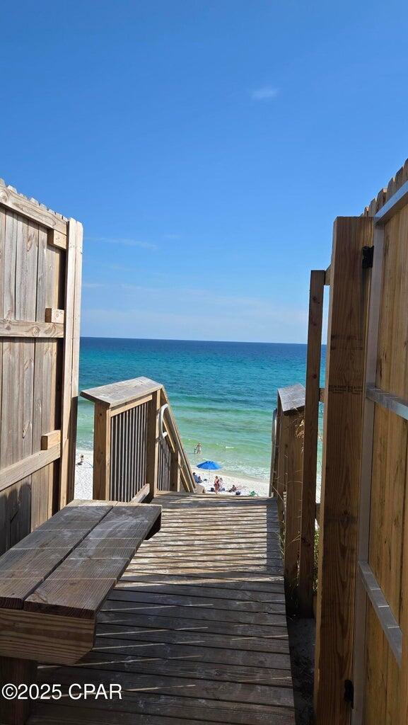 68 Clareon Dr Inlet Beach Inlet Beach, FL 32461 - Photo 5 of 37 a view of a balcony with chair and floor to ceiling window