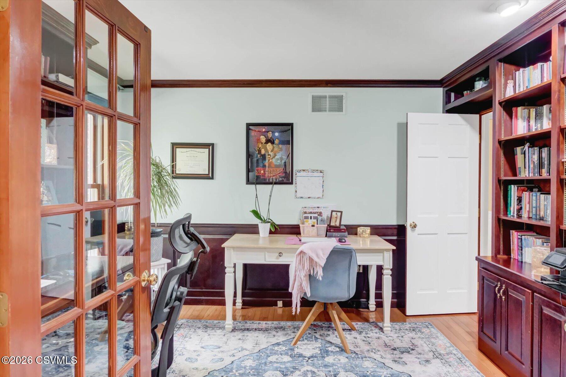 65 Crestview Drive Winfield, PA 17889 - Photo 22 of 70 a view of a workspace with furniture and a bookshelf