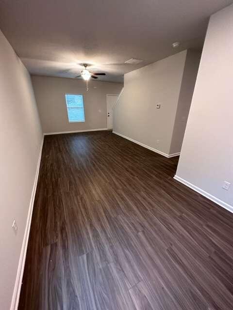 317 Lambert Overlook Circle Carrollton, GA 30117 - Photo 7 of 31 a view of empty room with wooden floor