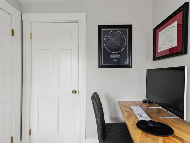 a workspace with furniture and lamp