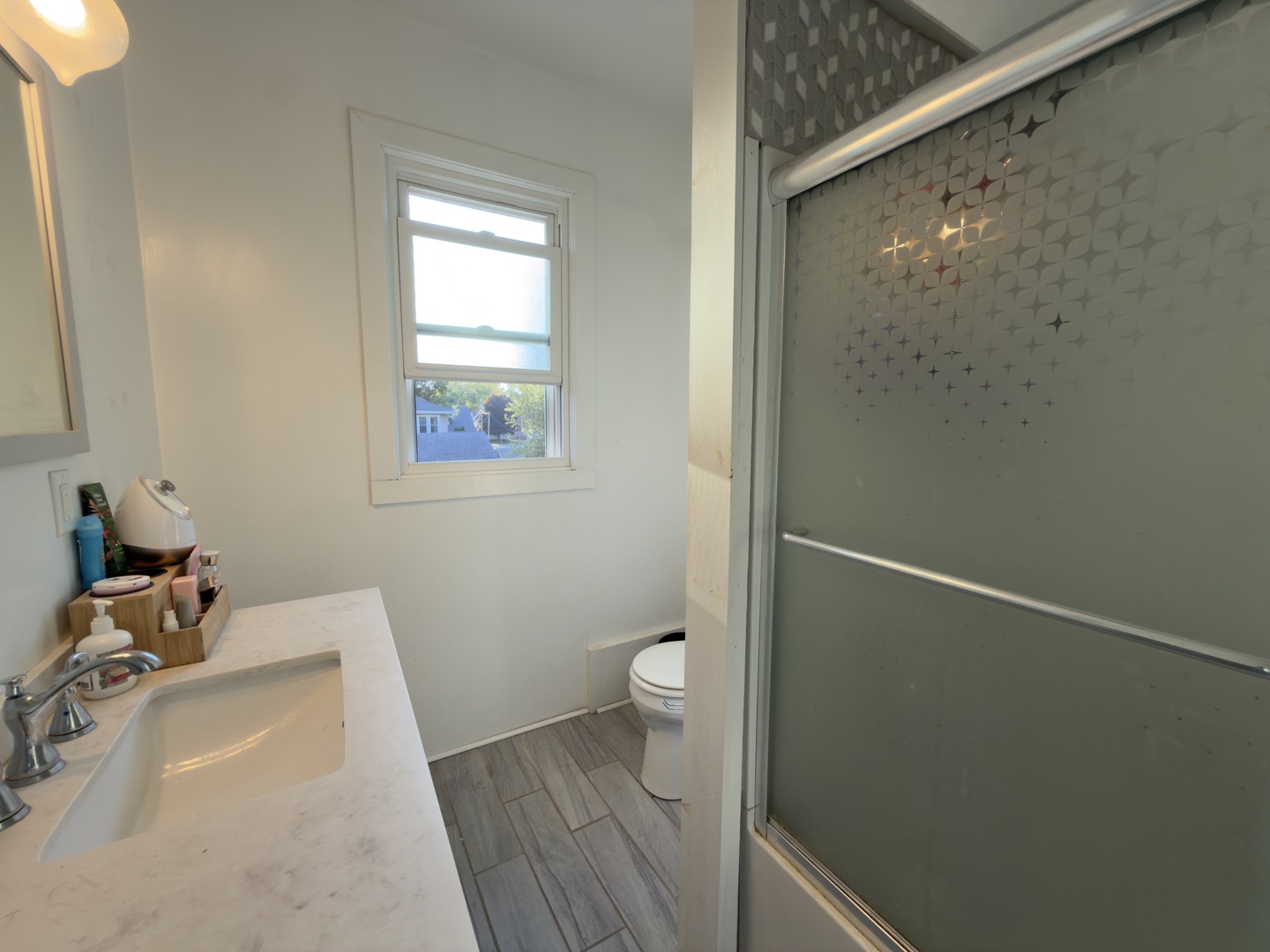 533 South 4th Street Watseka, IL 60970 - Photo 21 of 24 a bathroom with a sink and a toilet