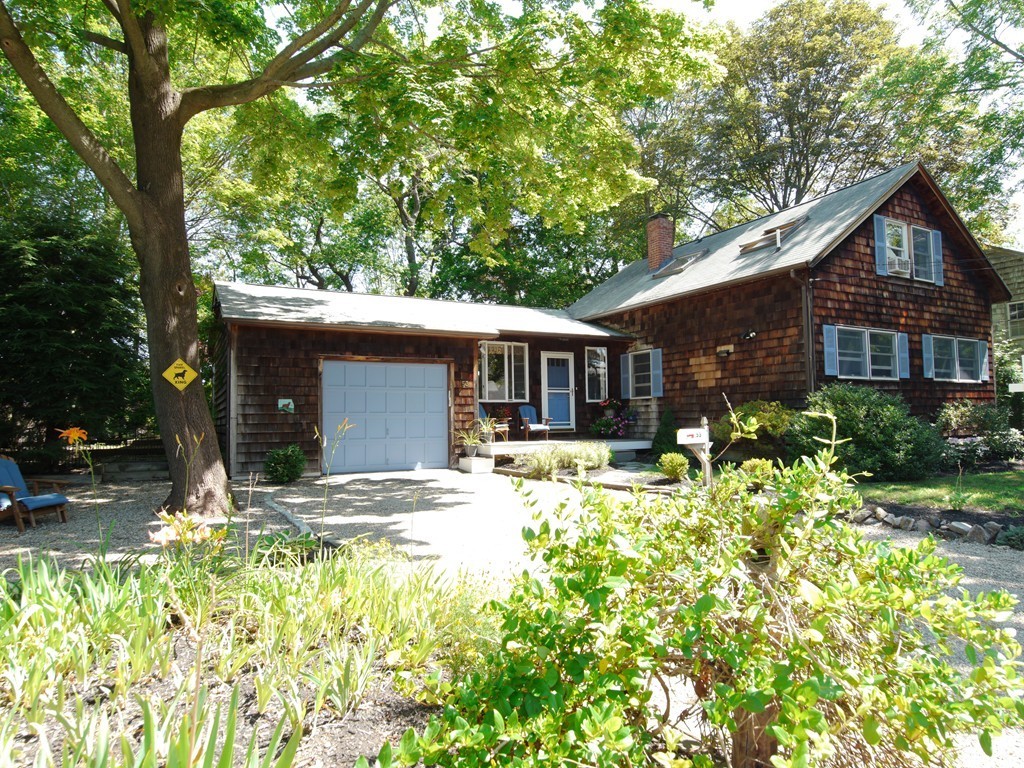 53 Overlook Road Marblehead, MA 01945 - Photo 15 of 24 a front view of a house with a yard and porch