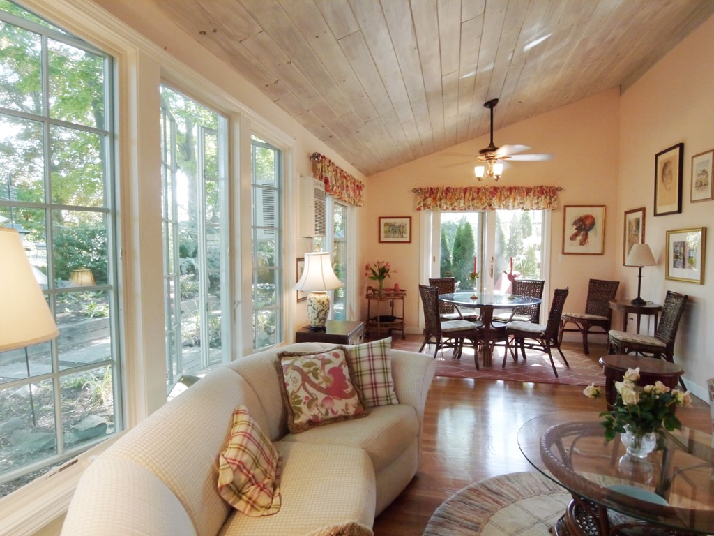 53 Overlook Road Marblehead, MA 01945 - Photo 2 of 24 a living room with furniture dining area and a large window