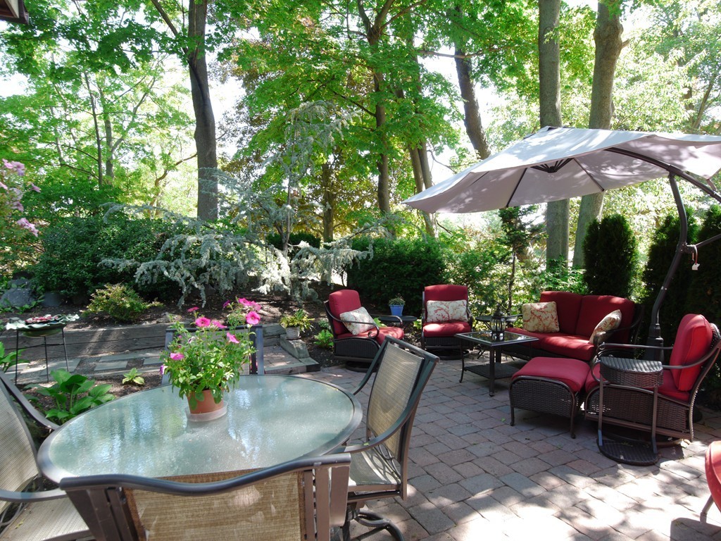 53 Overlook Road Marblehead, MA 01945 - Photo 22 of 24 a view of a backyard with sitting area and furniture