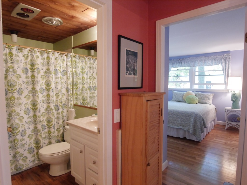 53 Overlook Road Marblehead, MA 01945 - Photo 8 of 24 a bathroom with a toilet sink and mirror