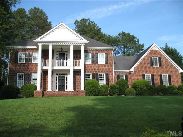 4105 John S Raboteau Wynd Raleigh, NC 27612 - Photo 1 of 20 a front view of a house with a yard