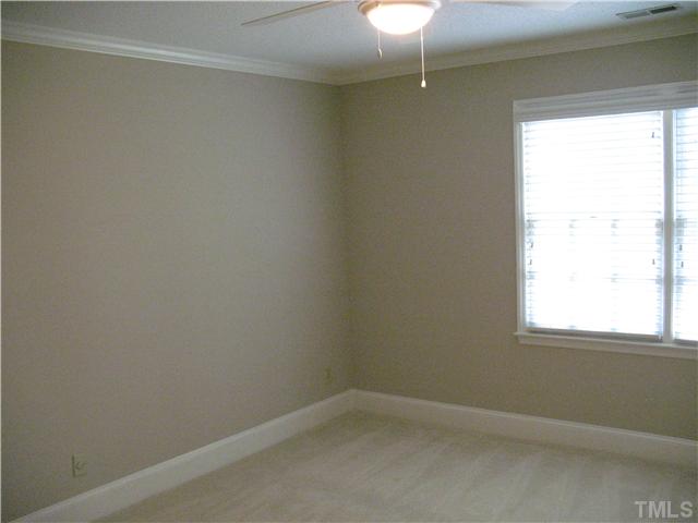 4105 John S Raboteau Wynd Raleigh, NC 27612 - Photo 14 of 20 an empty room with a window