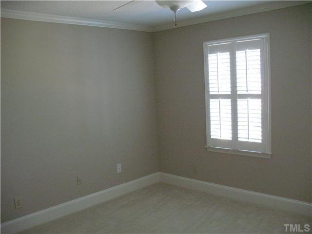 4105 John S Raboteau Wynd Raleigh, NC 27612 - Photo 15 of 20 an empty room with a window