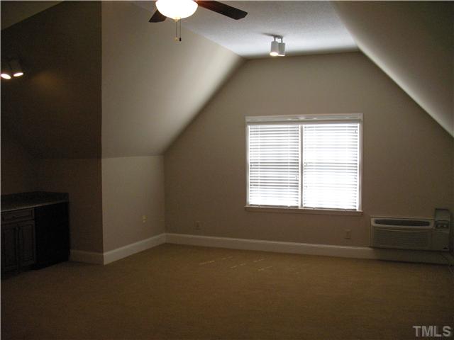 4105 John S Raboteau Wynd Raleigh, NC 27612 - Photo 17 of 20 an empty room with a window