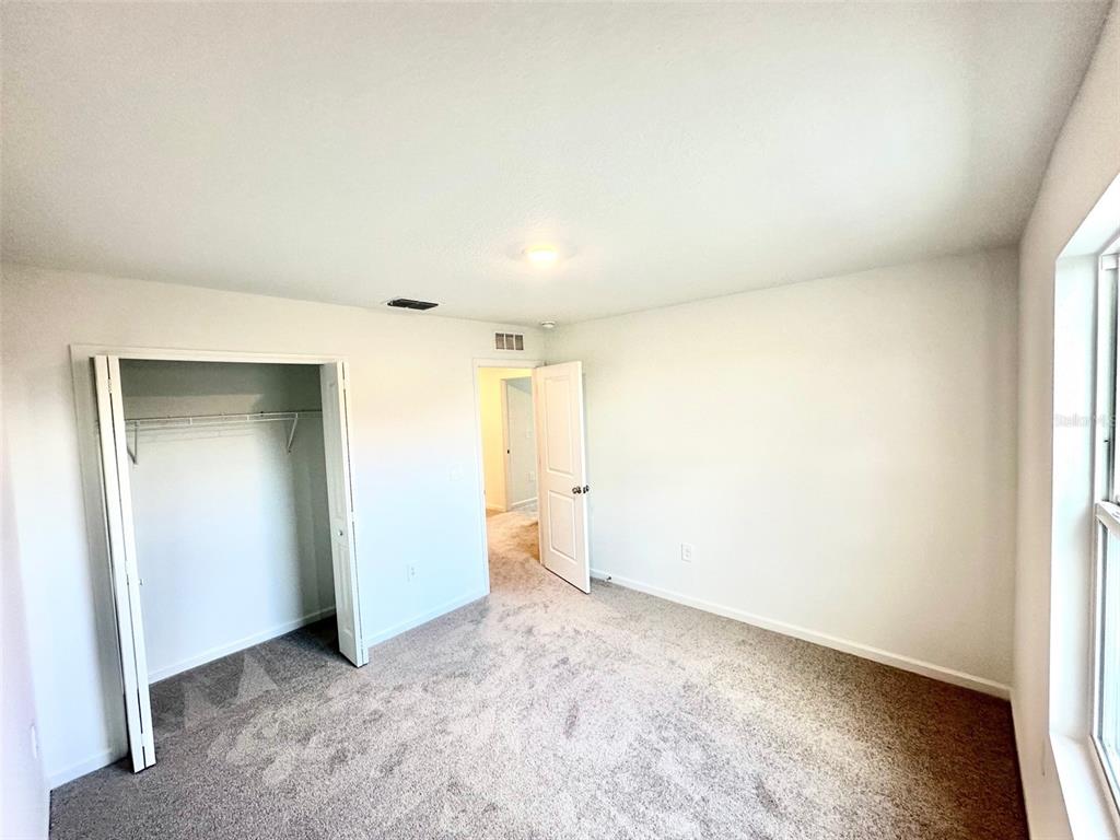 1029 Harold Pass Lake Wales, FL 33859 - Photo 18 of 24 an empty room with a natural light