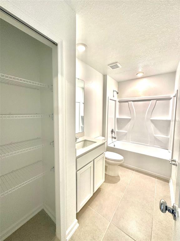 1029 Harold Pass Lake Wales, FL 33859 - Photo 19 of 24 a bathroom with a granite countertop sink a toilet and bathtub