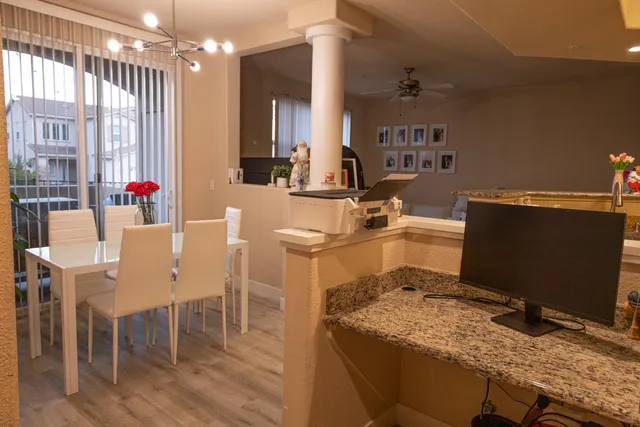 a workspace with furniture and window