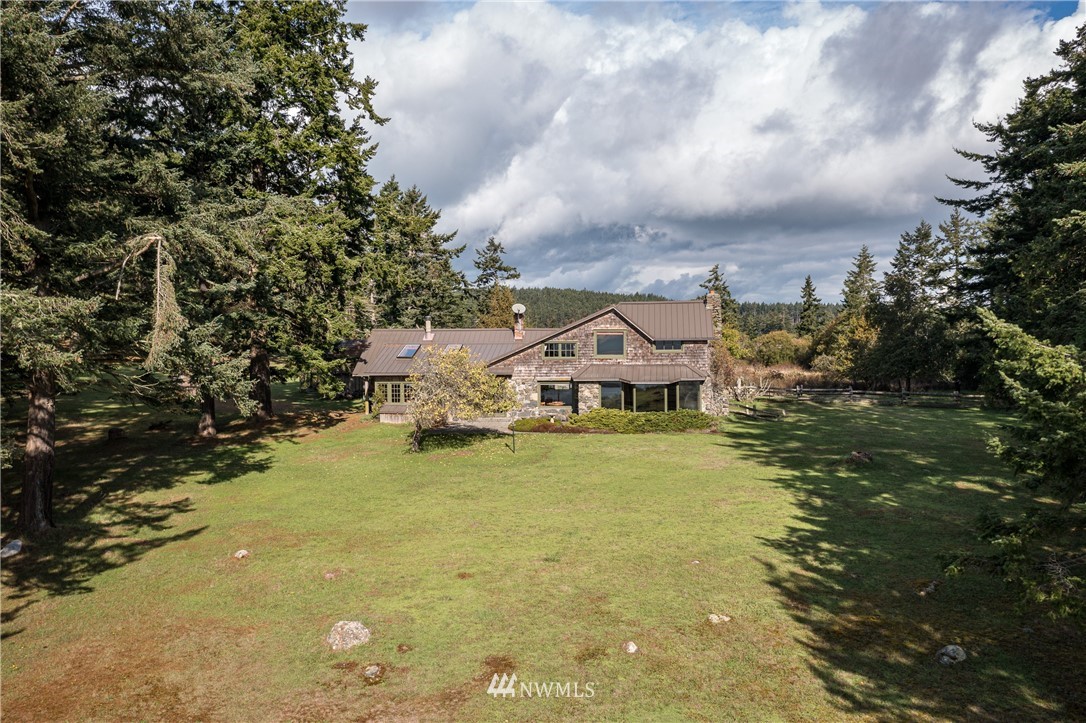 1428 Aleck Bay Road Lopez Island, WA 98261 - Photo 28 of 30 a front view of a house with a yard