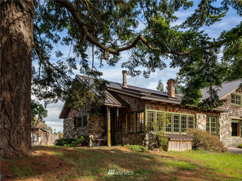 1428 Aleck Bay Road Lopez Island, WA 98261 - Photo 5 of 30 front view of house with a yard