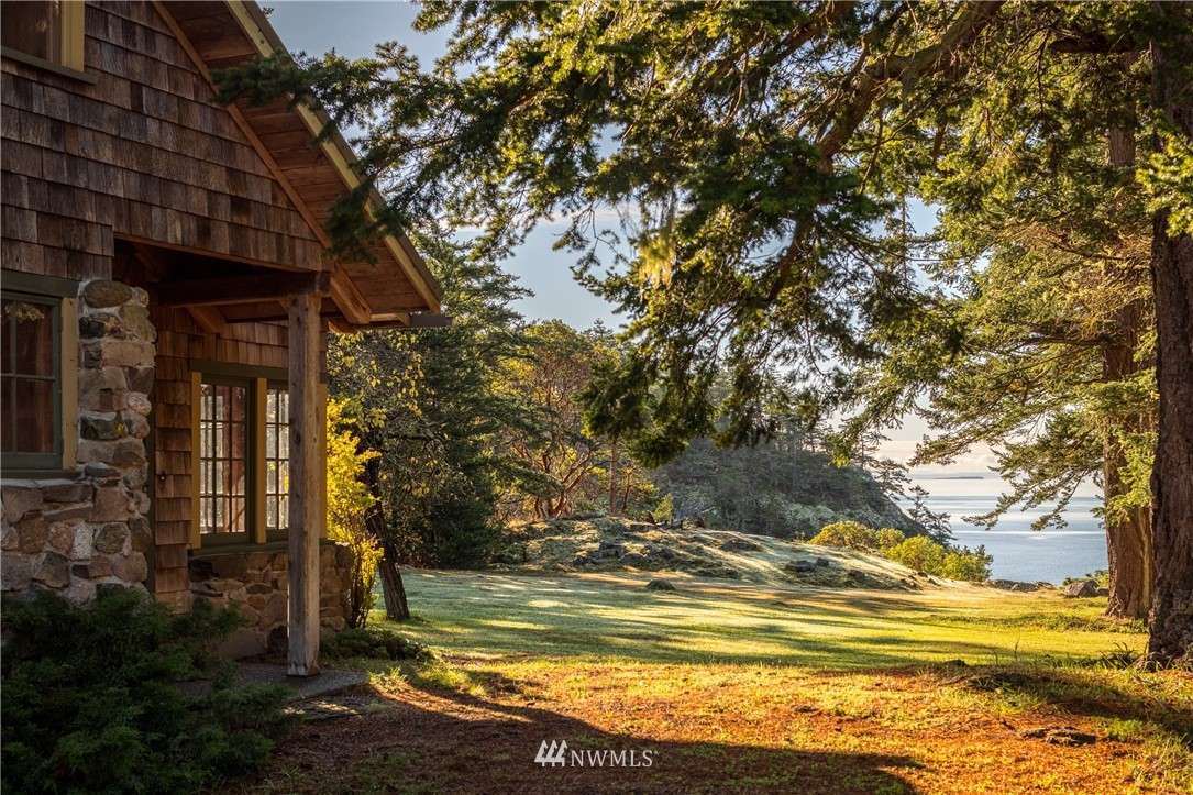 1428 Aleck Bay Road Lopez Island, WA 98261 - Photo 6 of 30 a view of a house with a large tree