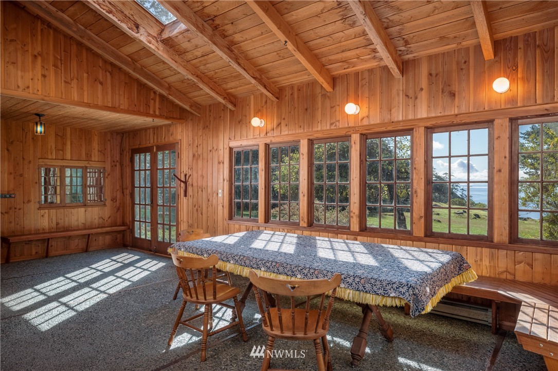1428 Aleck Bay Road Lopez Island, WA 98261 - Photo 7 of 30 a view of a patio with table and chairs