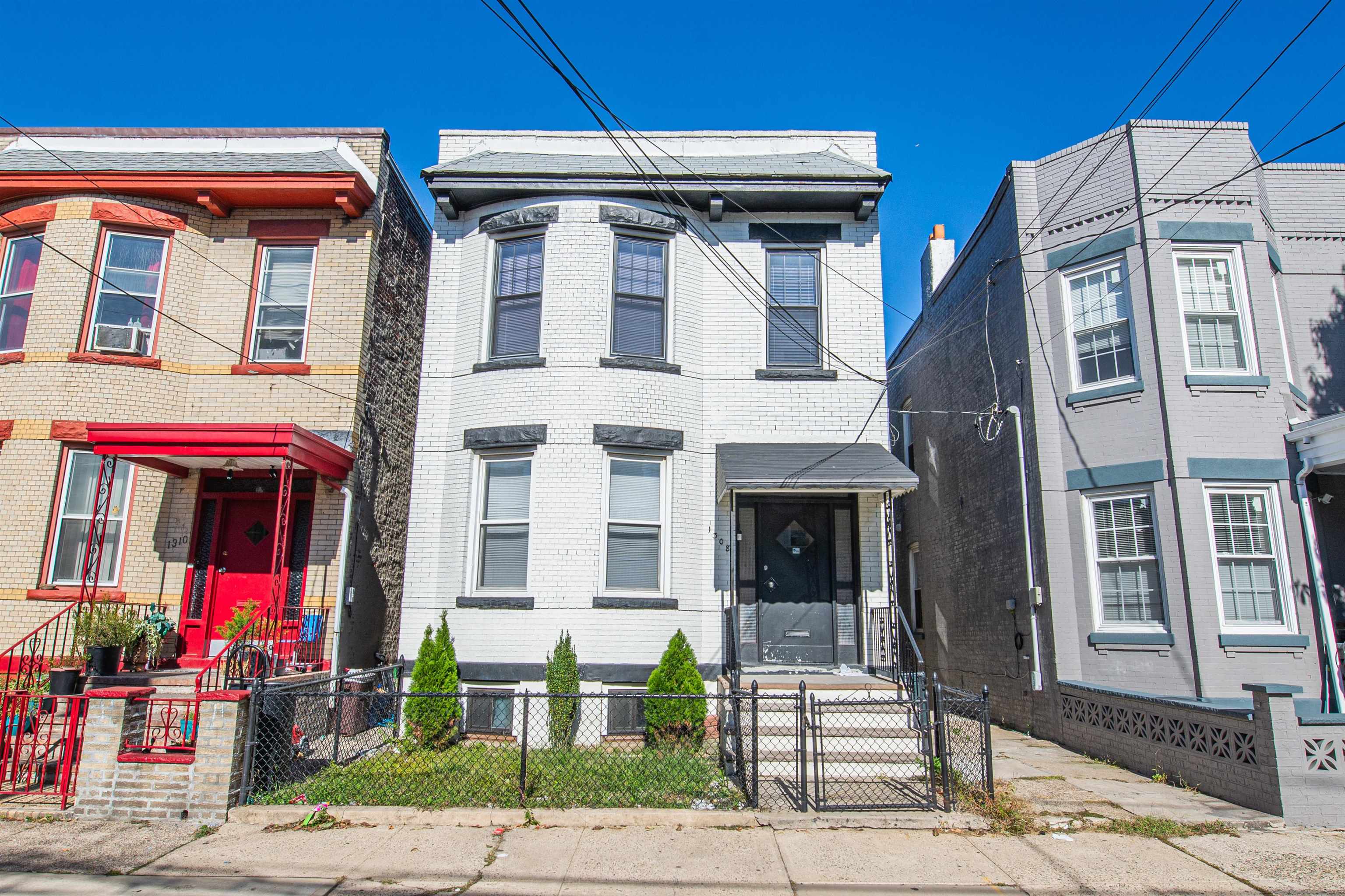 a front view of a building with street view