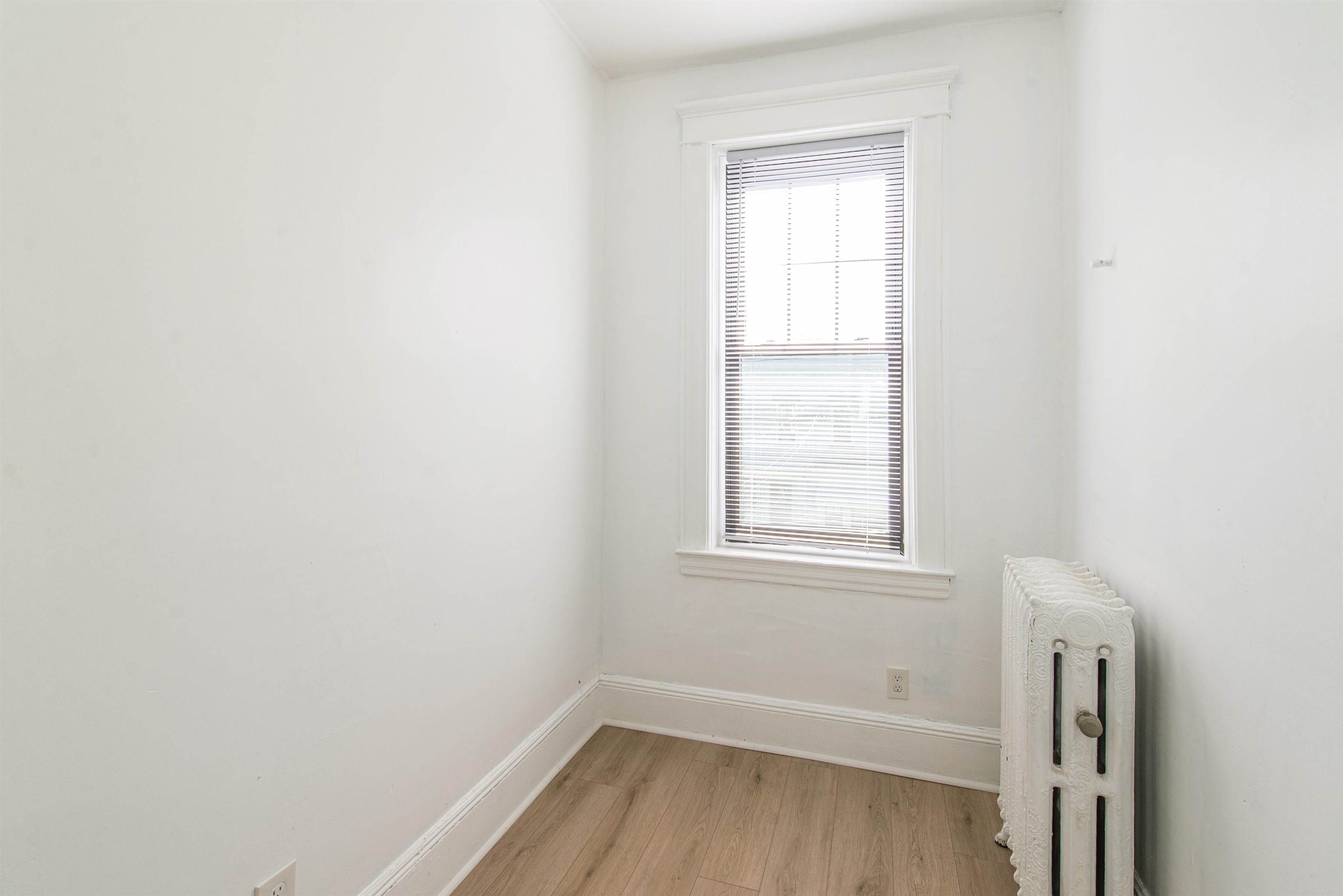 1308 27th Street, Unit 2 North Bergen, NJ 07047 - Photo 13 of 15 an empty room with a window