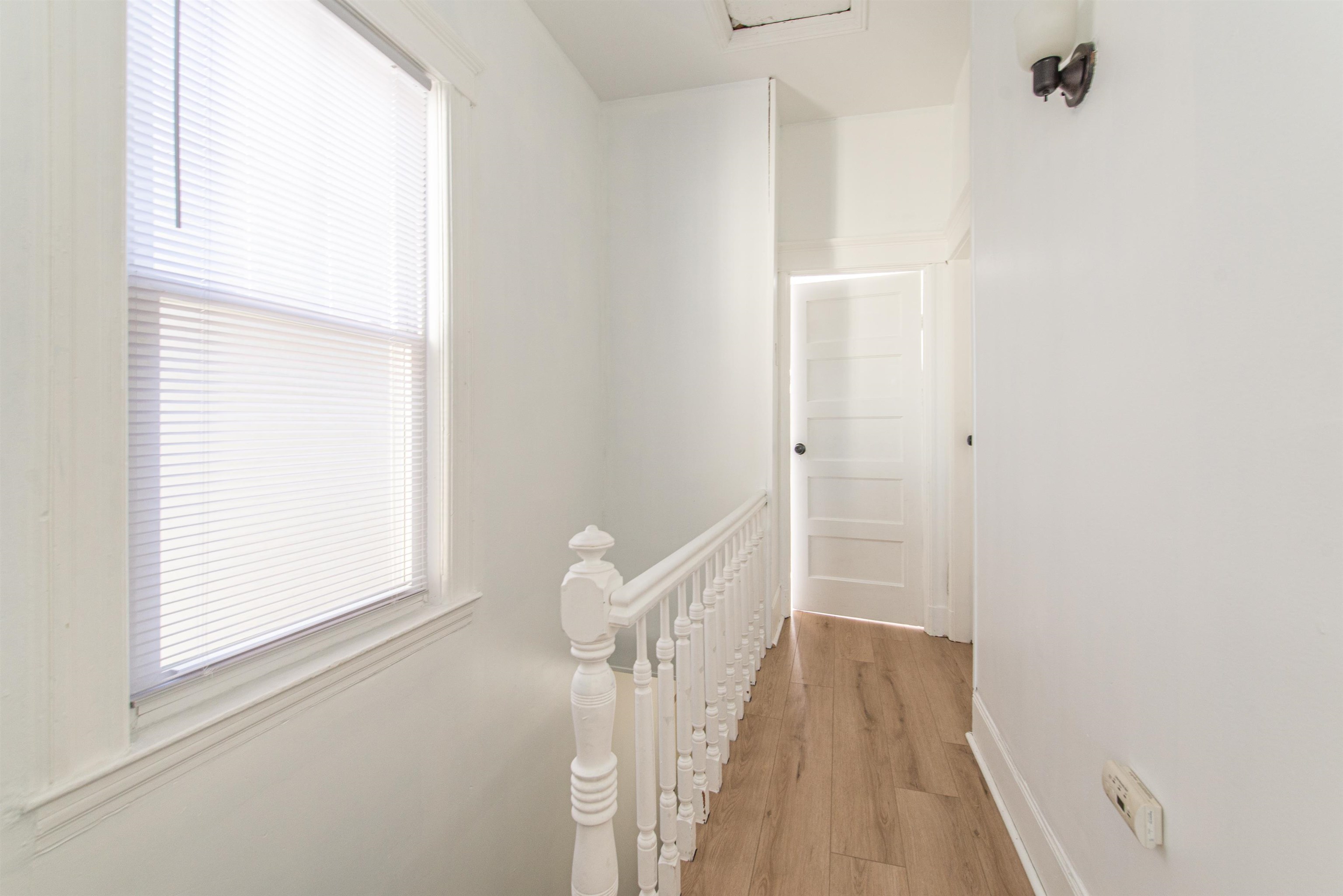 1308 27th Street, Unit 2 North Bergen, NJ 07047 - Photo 15 of 15 a view of a room with wooden floor and windows