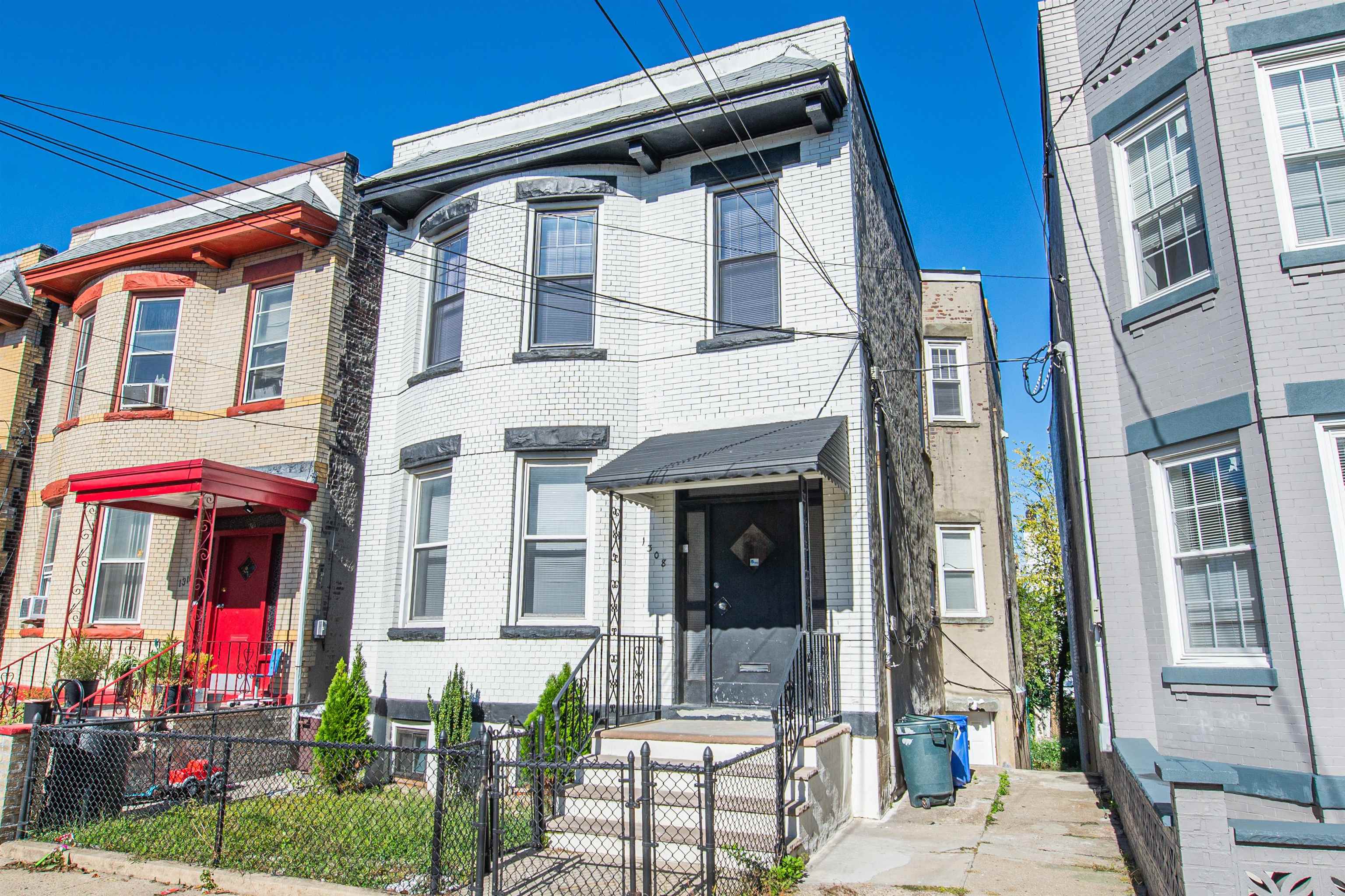 1308 27th Street, Unit 2 North Bergen, NJ 07047 - Photo 2 of 15 a front view of multiple houses