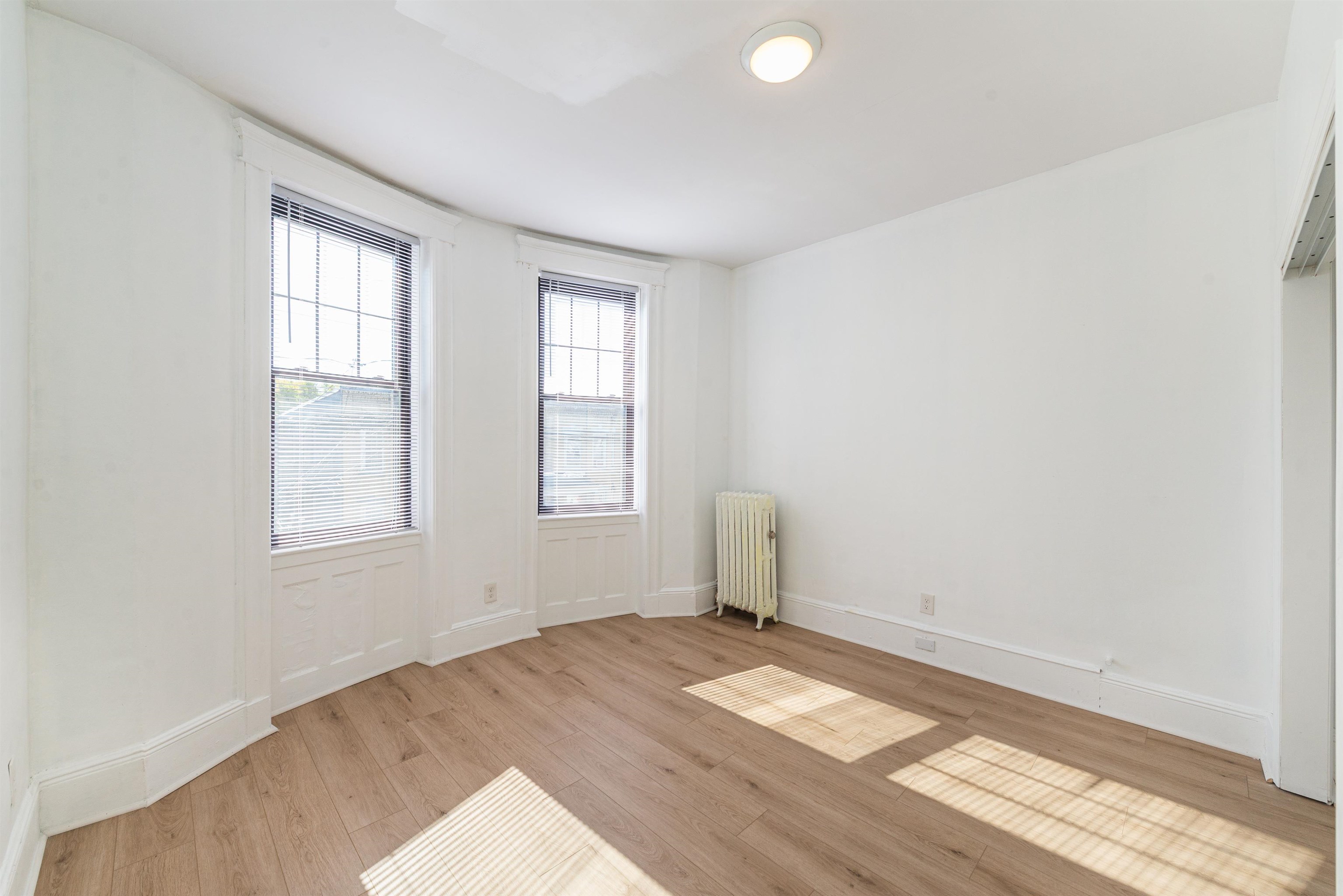 1308 27th Street, Unit 2 North Bergen, NJ 07047 - Photo 3 of 15 an empty room with a window