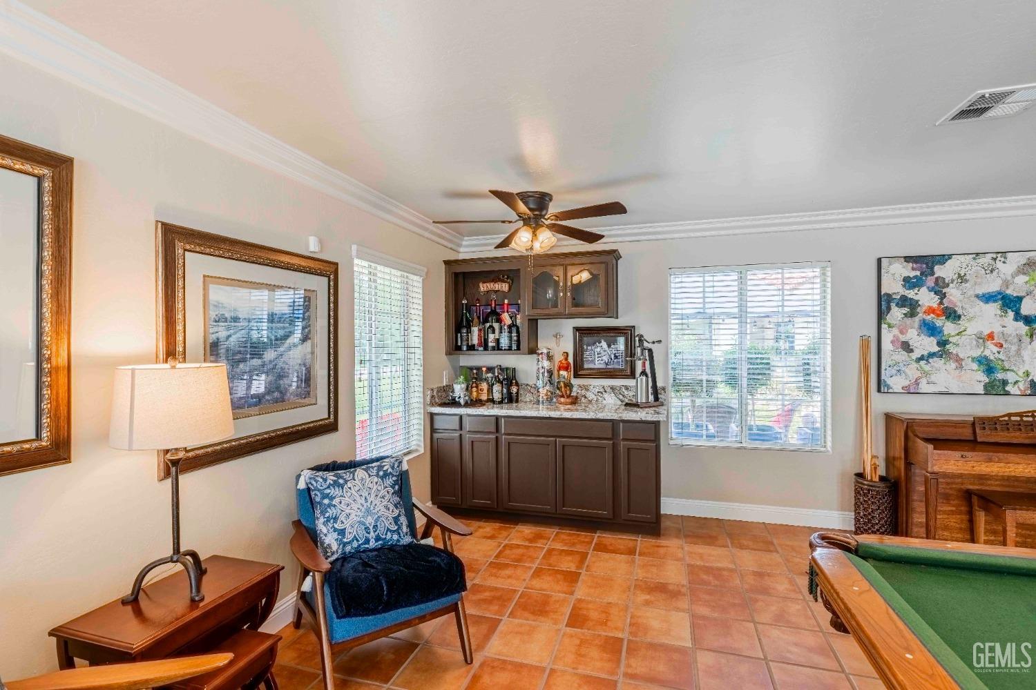 Undisclosed Address Bakersfield, CA 93314 - Photo 29 of 67 a living room with furniture and a flat screen tv