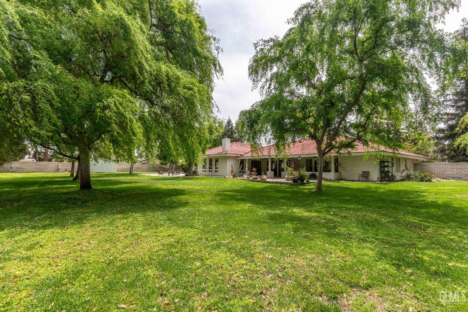 Undisclosed Address Bakersfield, CA 93314 - Photo 51 of 67 a view of a house with a big yard