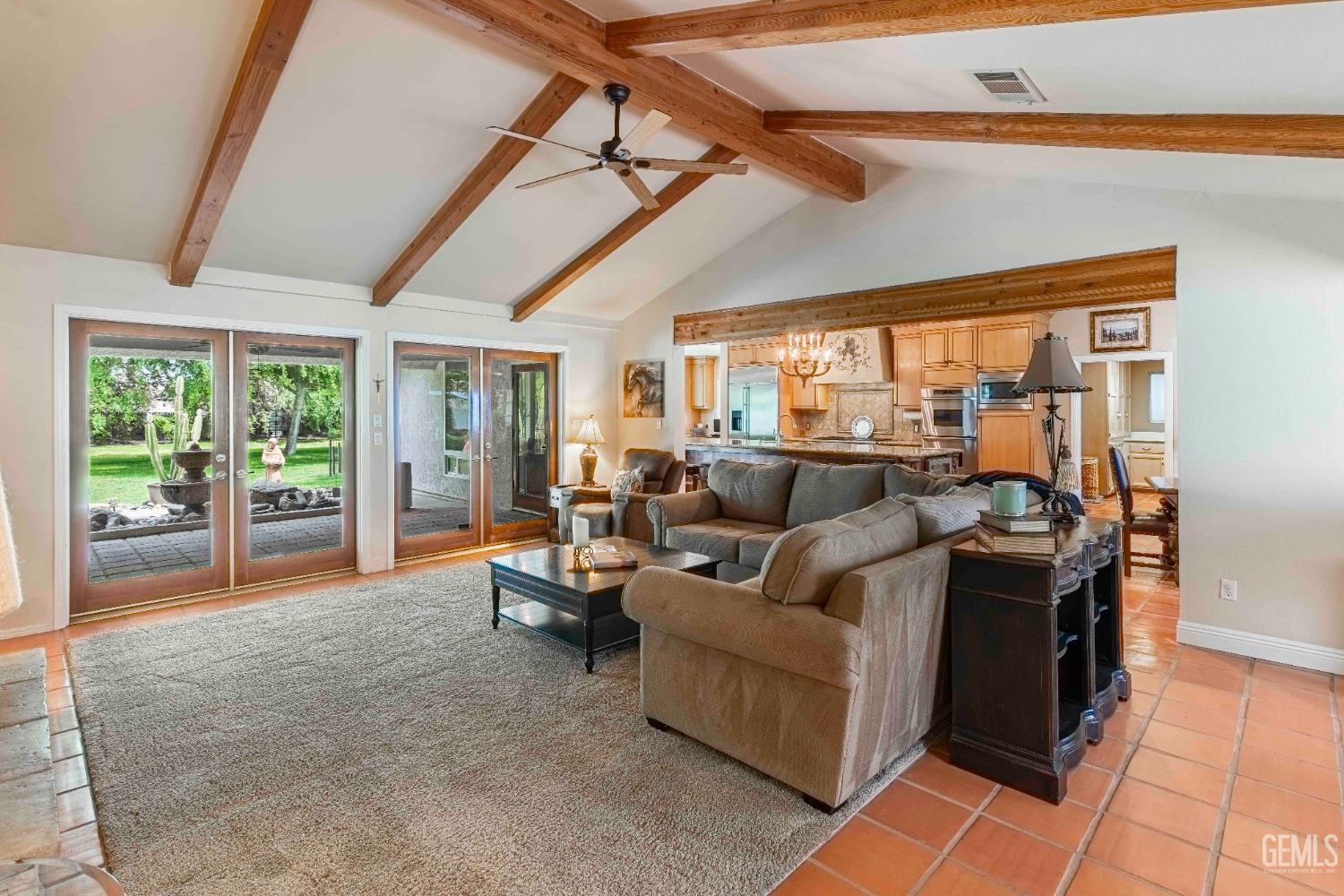 Undisclosed Address Bakersfield, CA 93314 - Photo 7 of 67 a living room with furniture and a large window
