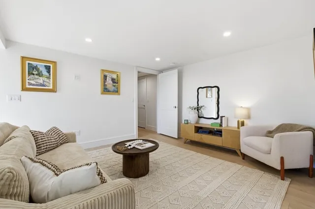 a living room with furniture and a couch