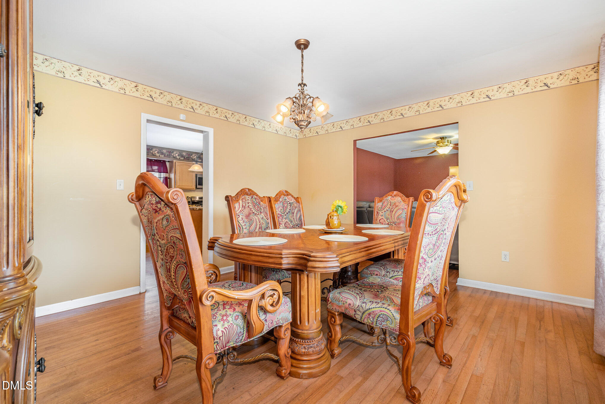 376-t K T K Allen Road Louisburg, NC 27549 - Photo 10 of 39 a view of a dining room with furniture and wooden floor
