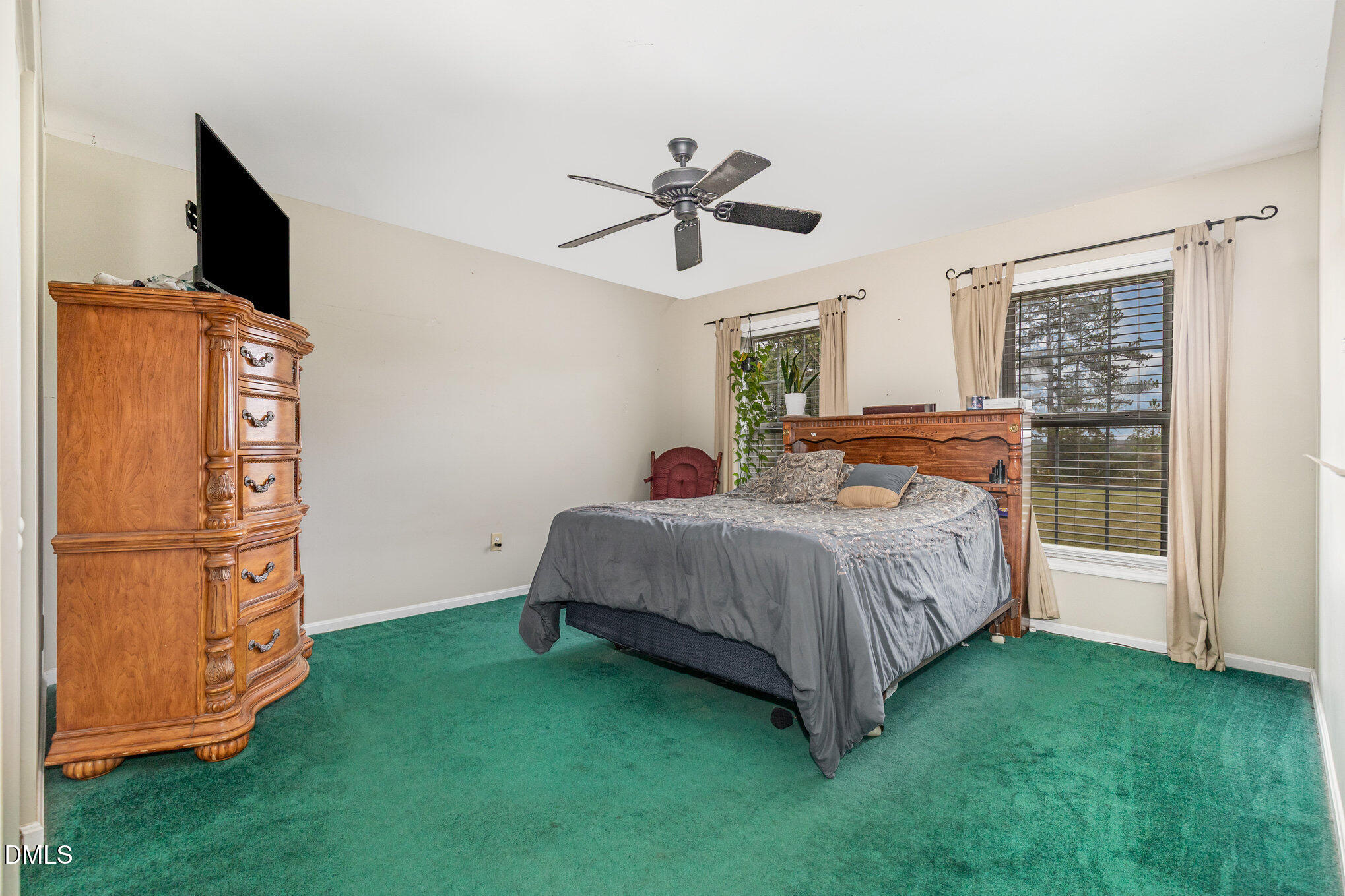 376-t K T K Allen Road Louisburg, NC 27549 - Photo 16 of 39 a bed room with a bed and a television