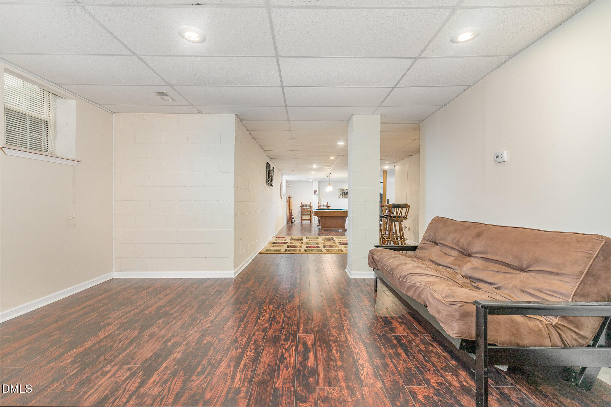 376-t K T K Allen Road Louisburg, NC 27549 - Photo 21 of 39 a living room with furniture and a wooden floor