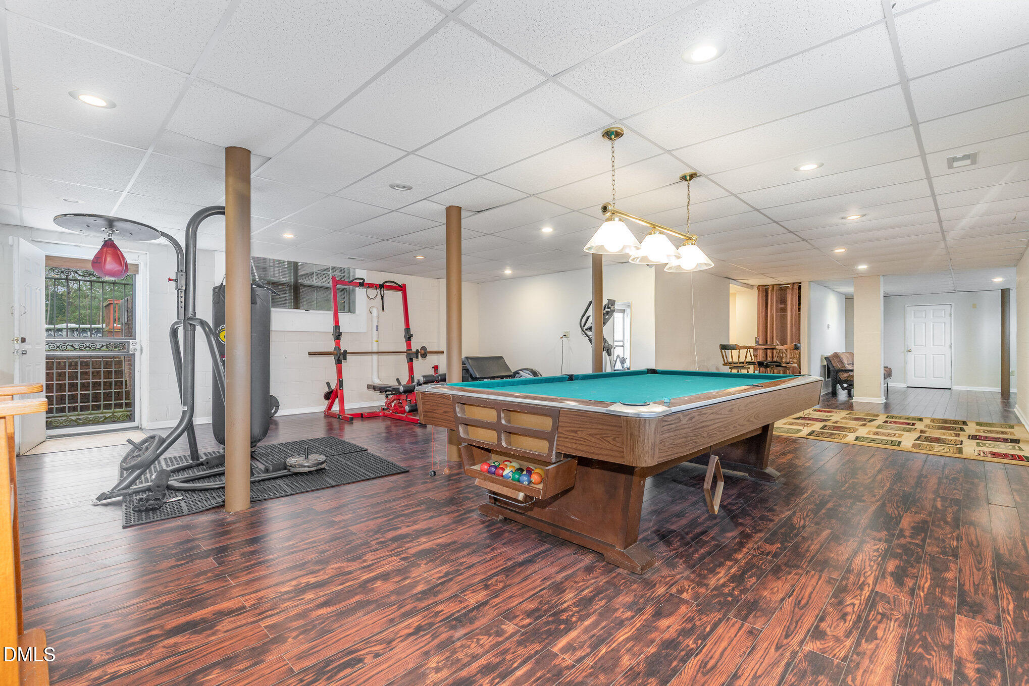 376-t K T K Allen Road Louisburg, NC 27549 - Photo 23 of 39 a room with wooden floors and pool table